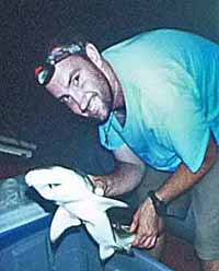 Photo of Alec Todd holding Lemon Shark