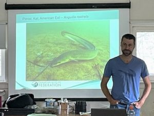 Photo of former Macoun Club member Nic Lapointe giving talk on eels