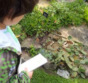 Photo of Macoun Club member with sketchpad in hand